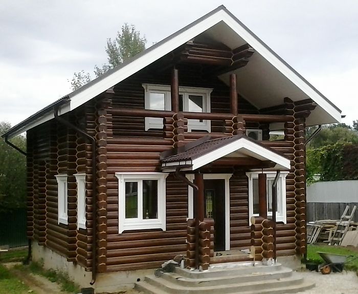 покраска дома из бревна