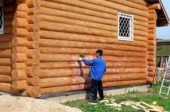 покраска дома из оцилиндрованного бревна цена